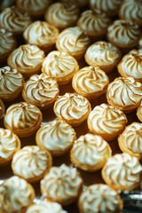 Sweet desserts, pastries on the table during the event. Catering servicing of guests and participants during mass events.