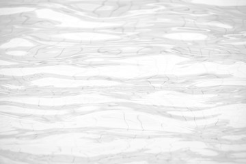 Calm water surface with small ripples, white wave abstract or rippled water texture background