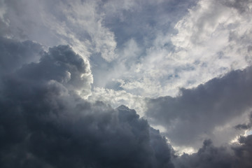 Naklejka na ściany i meble Dramatic sky background with stormy clouds, natural texture