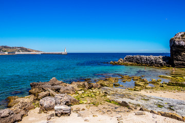 View from the beach of Isla de las Palomas to Tarifa and Punta del Santo, in Andalusia, Spain