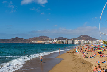 LAS PALMAS DE GRAN CANARIA, CANARY ISLANDS, SPAIN - OCTOBER 03, 2010: View of the beach Playa Las Canteras. Copy space for text.