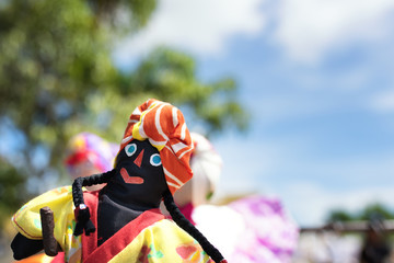 Portrait of a Cuban rag doll with a traditional costume 