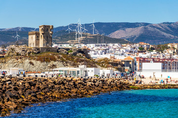 View of Tarifa with Castle of St. Catalina from Isla de las Palomas in Andalusia, Spain