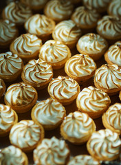 Sweet desserts, pastries on the table during the event. Catering servicing of guests and participants during mass events.