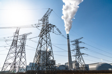 High voltage pole with power station