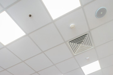 Design and details of the modern device ceilings in the room.
