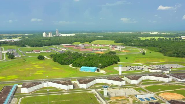 Aerial pull away shot of a federal prison 4k