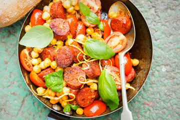 Chorizo, chickpeas, tomato, lemon and basil dish