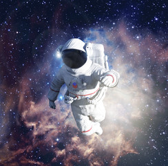 Astronaut exploring outer space conducting spacewalk. © Photocreo Bednarek