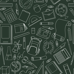 Back to school seamless pattern. Hand drawn vector school supplies and stationery on school Board.