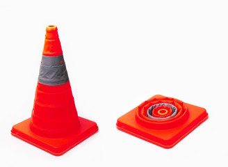 The cone is a warning signal to be careful on the road.