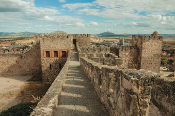 Fototapeta na wymiar Pathway on top of stone wall at the Castle of Trujillo