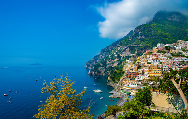 Landscaoe of beach and colorful buildings  in Positano town  at  Amalfi Coast, Italy.