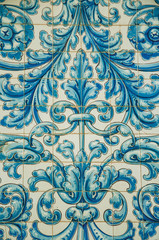 Blue floral pattern hand-painted on ceramic tiles at Caceres