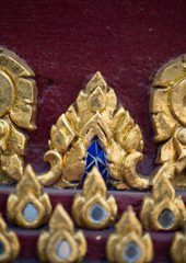 Fototapeta na wymiar Thai pattern on wall of church at Wat Rakhang Khositaram Bangkok ,Thailand