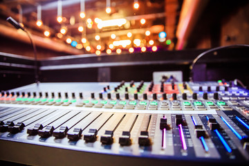 Plakat Sound recording studio mixer desk at a concert: professional music recording