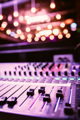 Sound recording studio mixer desk at a concert: professional music recording