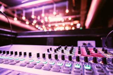 Obraz na płótnie Canvas Sound recording studio mixer desk at a concert: professional music recording