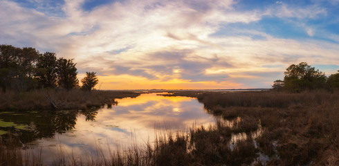 Panoramic sunset over wetlands at Assateague Island in Maryland