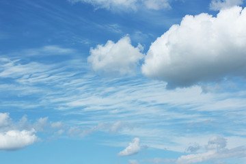 White fluffy clouds in the blue sky