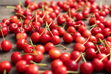 berries, cherry, red sweet cherry on a wooden table, summer