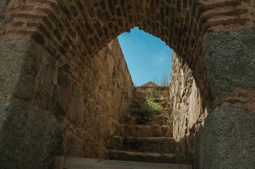 Staircase going up to a bricks watchtower at Avila
