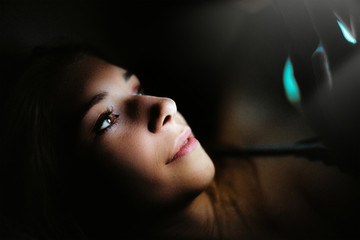 Woman with smartphone in the night