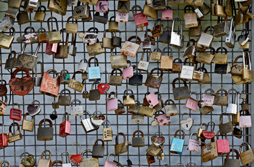 Love locks on a fence of a bridge