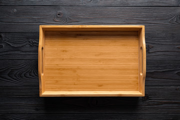bamboo tray on wooden background
