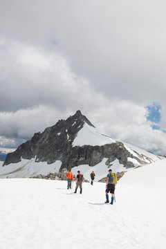 Rear view of four mountaineers approaching Cypress Peak, B.C.