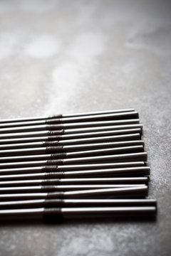 Drinking straws on a black table