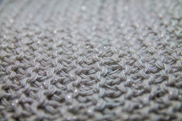 Perspective view of gray handmade knitted pattern background