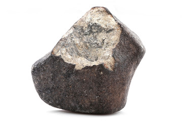 fragment of the Chelyabinsk meteorite (fallen 15 February 2013) isolated on white background