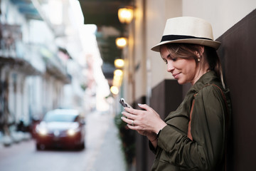 Young Woman Vacationing in Panama waits for Uber car in Casco Antiguo