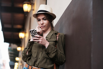 Woman as Tourist Lost Direction and Looks at GPS Map on Mobile Phone