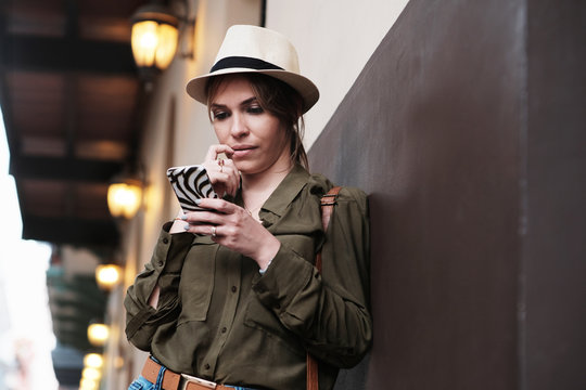 Woman as Tourist Lost Direction and Looks at GPS Map on Mobile Phone
