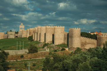 Towers with large wall over the hill encircling the Avila