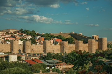 Stone towers on large wall over the hill encircling Avila