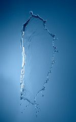 blue color water splash isolated on empty background, studio photo