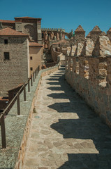 Fototapeta na wymiar Pathway over wall around the town and Cathedral of Avila