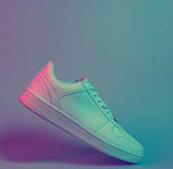 Fashionable white sneakers, retro futurism red blue neon light, minimalism