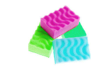 Colored cleaning sponges isolated on white background.