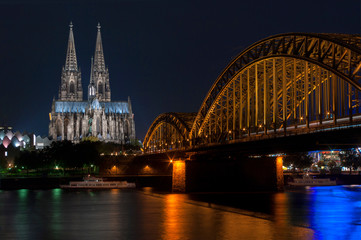 Fototapeta premium Europe, Germany, Cologne, cathedral and Hohenzollern bridge dusk