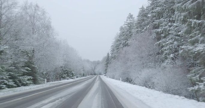 Winter Driving - driving on a snowy country road - POV shot - ProRes