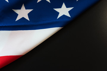 United states of america flag close up in dark background with copy space