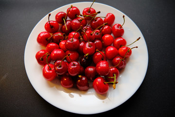Sweet fragrant sweet cherries for summer breakfast.