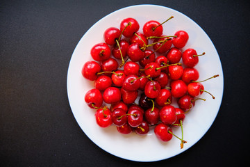 Sweet fragrant sweet cherries for summer breakfast.