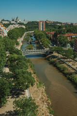 Fototapeta na wymiar Royal Palace and Almudena Cathedral and Manzanares River at Madrid