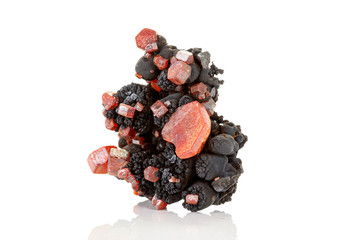 Macro mineral stone Vanadinite on a white background