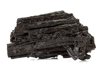 Macro stone black mineral tourmaline Scherl on white background